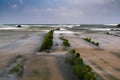 Long exposure view of Flysch rock formations at low tide at Barrika beach near Bilbao Royalty Free Stock Photo