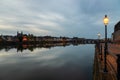 Long exposure view of the historic skyline of Maastricht with a view over the river Meuse and the old roman bridge Royalty Free Stock Photo