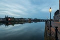 Long exposure view of the historic skyline of Maastricht with a view over the river Meuse and the old roman bridge Royalty Free Stock Photo