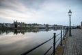 Long exposure view of the historic skyline of Maastricht with a view over the river Meuse and the old roman bridge Royalty Free Stock Photo