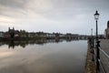 Long exposure view of the historic skyline of Maastricht with a view over the river Meuse and the old roman bridge Royalty Free Stock Photo