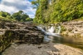 A long exposure view of the lower falls at Stainforth Force, Yorkshire Royalty Free Stock Photo
