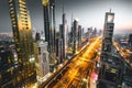 Long exposure view of traffic and skyline from rooftop at sunset Dubai - UAE Royalty Free Stock Photo