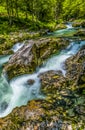 A long exposure view up the riverbed on the Mostnica river in the Mostnica gorge in Slovenia Royalty Free Stock Photo