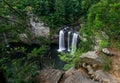 Long exposure water fall in lush green forest canon Royalty Free Stock Photo