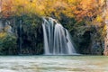 Long exposure of a waterfall flowing down into a lake in Plitvice Lakes national park Royalty Free Stock Photo