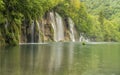 long exposure wide shot of a waterfall and lake at plitvice lakes national park on a rainy spring day Royalty Free Stock Photo