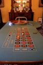 Long, felt covered Roulette table with chips placed on winning numbers,Canfield Casino,Saratoga Springs,New York,2016