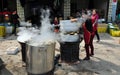 Long Feng, China: Women Preparing Food