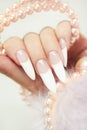 Long French manicure. Royalty Free Stock Photo