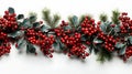 long garland of Christmas tree branches and red berries