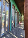 Long glass windows and door in a resort in Thailand
