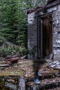 Old house with a sprit standing in a pair of shoes Royalty Free Stock Photo