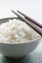 Long grain rice bowl with chopsticks Royalty Free Stock Photo