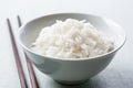 Long grain rice bowl with chopsticks Royalty Free Stock Photo