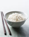 Long grain rice bowl with chopsticks Royalty Free Stock Photo