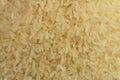 Long grain white rice background. Macro. Rice texture. Top view Royalty Free Stock Photo