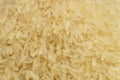 Long grain white rice background. Macro. Rice texture. Top view Royalty Free Stock Photo