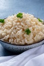 Long grain white rice close-up on a blue background Royalty Free Stock Photo