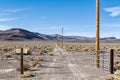 A long gravel driveway off the main road in the Nevada desert, USA Royalty Free Stock Photo