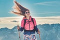 Long hair of a girl blown up by the strong wind during a mountain Royalty Free Stock Photo