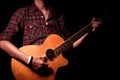 Long hair guy playing guitar acoustic Royalty Free Stock Photo