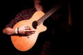 Long hair guy playing guitar acoustic Royalty Free Stock Photo