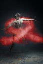 Long hair muscle man dancer in dust. HIV / AIDS disease concept Royalty Free Stock Photo