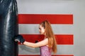 Long hair pretty girl boxing in the gym Royalty Free Stock Photo