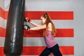 Long hair pretty girl boxing in the gym Royalty Free Stock Photo