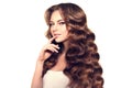 Long hair. Waves Curls Hairstyle. Hair Salon. Updo. Fashion mode Royalty Free Stock Photo