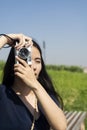 Long hair woman and her camera