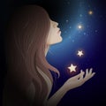 Long hair woman looking up at the sky and stars falling