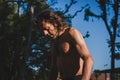 Long haired athlete getting ready for running