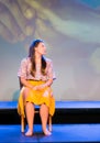 long-haired brunette woman in various positions and barefoot expressions with long skirt Royalty Free Stock Photo