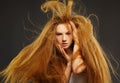 Long-haired curly redhead woman Royalty Free Stock Photo