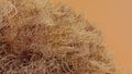 long-haired fur pompon, ball of hair, cotton wool, fluffy ball, colorful furry sphere, close-up fragment Royalty Free Stock Photo