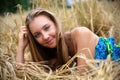 Long-haired girl lying in the crop