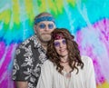 Long haired woman and bearded man in headbands