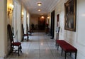 Long hallway with historic paintings and furniture, George Eastman Museum, Rochester, New York, Summer, 2020