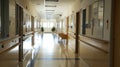 A long hallway in a hospital with glass doors Royalty Free Stock Photo