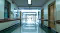 A long hallway in a hospital with glass doors Royalty Free Stock Photo