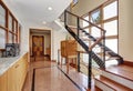 Long hallway interior with polished granite tile flooring