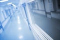 Long hallway of medical building, unfocused background