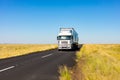 Long Haul overnight Trucking Logistics on a country highway road in South African Farmland region