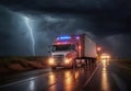 Long Haul Semi-Truck with Cargo Trailer at Night Driving Through Rain