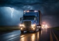 Long Haul Semi-Truck with Cargo Trailer at Night Driving Through Rain