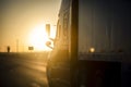 Long Haul 18 Wheel Truck driving on a highway at sunrise or sunset Royalty Free Stock Photo