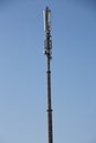 long high cell tower in front of the sky Royalty Free Stock Photo