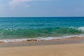 Ocean tide waves on paradise sandy beach